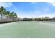 Well maintained outdoor tennis court featuring a newer looking net at 2017 Flora Pass Pl, Kissimmee, FL 34747