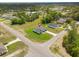 Aerial view highlights this property's location on a corner lot in a peaceful, tree-lined neighborhood at 2436 Sw 155Th Ln, Ocala, FL 34473