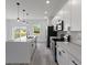 Well-equipped kitchen showcasing modern appliances, granite countertops, and lots of cabinet space at 2436 Sw 155Th Ln, Ocala, FL 34473