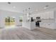 Bright, spacious kitchen with stainless steel appliances and a large center island at 2436 Sw 155Th Ln, Ocala, FL 34473