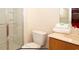 Bathroom with shower and towels located next to the sink and toilet at 3008 Secret Lake Dr, Kissimmee, FL 34747