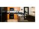Modern kitchen boasts granite countertops, stainless steel appliances, and ample cabinet space at 3008 Secret Lake Dr, Kissimmee, FL 34747