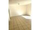 Bright bedroom featuring neutral walls, tiled flooring, base molding and ample natural light at 3071 George Mason Ave # A, Winter Park, FL 32792