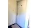A white interior front door with silver hardware and welcome mat at 3071 George Mason Ave # A, Winter Park, FL 32792