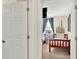 Bedroom featuring twin beds and Disney themed wall at 3154 Yellow Lantana Ln, Kissimmee, FL 34747