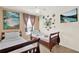 Comfortable bedroom features twin beds, ceiling fan, and beach themed decor for a relaxing, inviting space at 3154 Yellow Lantana Ln, Kissimmee, FL 34747