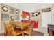 The dining area has a large table, seating for eight, and is adjacent to the kitchen at 3154 Yellow Lantana Ln, Kissimmee, FL 34747