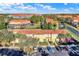 View of condos with private parking and landscaped grounds in a well maintained housing community at 3154 Yellow Lantana Ln, Kissimmee, FL 34747