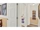 Hallway featuring cartoon themed wall decor and access to other areas of the house at 3154 Yellow Lantana Ln, Kissimmee, FL 34747