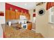 Well-equipped kitchen features granite countertops, modern appliances, and ample cabinet space at 3154 Yellow Lantana Ln, Kissimmee, FL 34747