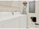 Clean laundry room with white washer and dryer at 3154 Yellow Lantana Ln, Kissimmee, FL 34747