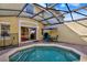 Enclosed pool area with patio furniture, perfect for relaxation and enjoying the outdoors in privacy at 3154 Yellow Lantana Ln, Kissimmee, FL 34747