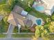 Stunning aerial view of home with beautiful landscaping, private pool, and elegant outdoor living space at 3308 Middlesex Rd, Orlando, FL 32803