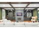 Comfortable living room boasting coffered ceilings, custom shelving, and fireplace at 3308 Middlesex Rd, Orlando, FL 32803