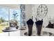 Dining area near a window with decorative glassware on the table at 4589 Boxwood Way, Mount Dora, FL 32757