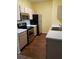 Well-equipped kitchen with stainless steel appliances, ample counter space, and modern cabinetry at 5455 Vineland Rd # 3303, Orlando, FL 32811