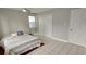 Bright bedroom featuring a ceiling fan, closet, and tile flooring at 5616 Clearview Dr, Orlando, FL 32819