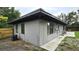 Exterior of home featuring an air conditioner and backyard at 5616 Clearview Dr, Orlando, FL 32819