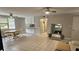 Spacious living room with a dining area and partial kitchen view at 5616 Clearview Dr, Orlando, FL 32819