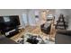 Cozy living room with hard wood floors and plenty of space at 5616 Clearview Dr, Orlando, FL 32819