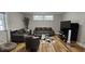 Cozy living room with a modern interior and bright window at 5616 Clearview Dr, Orlando, FL 32819