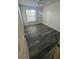 Bedroom with ceiling fan and window at 5951 Village Cir # Ge, Orlando, FL 32822