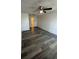 Bedroom featuring an ensuite bathroom and ceiling fan at 5951 Village Cir # Ge, Orlando, FL 32822
