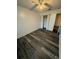 Neutral bedroom with a ceiling fan and closet at 5951 Village Cir # Ge, Orlando, FL 32822