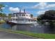 Unique two-story paddle boat structure on the water with fountain views at 5951 Village Cir # Ge, Orlando, FL 32822