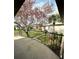 Peaceful balcony offers an extended living space with views of the well-maintained landscaping at 76 Windtree Ln # 201, Winter Garden, FL 34787