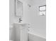 Bathroom with vanity and mirror beside a tub and shower with white tile at 1029 Colyer St, Orlando, FL 32805