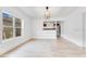 Dining room with a contemporary light fixture and view of stainless appliances at 1029 Colyer St, Orlando, FL 32805