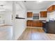 Kitchen with classic wood cabinets and modern appliances at 1029 Colyer St, Orlando, FL 32805