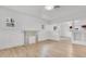 Bright living room with wood floors and a decorative fireplace at 1029 Colyer St, Orlando, FL 32805