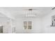 Bright living room featuring an eye-catching rectangular chandelier at 1029 Colyer St, Orlando, FL 32805