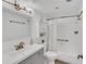 Bright bathroom featuring a shower and tub combination at 1038 E Michigan St # B, Orlando, FL 32806