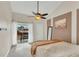 Inviting bedroom with ceiling fan and balcony access at 1038 E Michigan St # B, Orlando, FL 32806