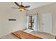 Bright bedroom with balcony and a ceiling fan at 1038 E Michigan St # B, Orlando, FL 32806