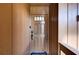 Close-up view of the front door showing welcome mat and exterior elements at 1038 E Michigan St # B, Orlando, FL 32806