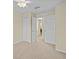 Bedroom with a ceiling fan and closet at 1208 Bella Rose Ct, Davenport, FL 33896