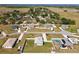 This aerial view showcases the community and the home's location within the neighborhood, highlighting its spacious lot at 12524 Garrett Pl, Grand Island, FL 32735