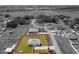 Aerial view of home highlighting property lines, showcasing a well-maintained yard in a quiet, established neighborhood at 12524 Garrett Pl, Grand Island, FL 32735