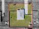 Aerial view of home, landscaped yard, fence, and driveway at 12524 Garrett Pl, Grand Island, FL 32735