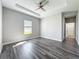 Bright Primary bedroom with a tray ceiling and plenty of room at 12524 Garrett Pl, Grand Island, FL 32735