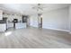 Spacious open-plan living area featuring modern finishes and abundant natural light at 12524 Garrett Pl, Grand Island, FL 32735