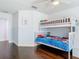 Charming bedroom complete with hardwood flooring, bunk beds, and ample lighting at 12627 Boggy Pointe Dr, Orlando, FL 32824