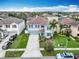 Two-story home with a well-manicured lawn, lovely landscaping and a two-car garage in a desirable neighborhood at 12627 Boggy Pointe Dr, Orlando, FL 32824