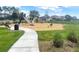 Community playground with slide, climbing wall and spring rider at 12627 Boggy Pointe Dr, Orlando, FL 32824