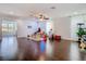 Inviting playroom with hardwood floors, play furniture, and a ceiling fan, ideal for creative play and fun at 12627 Boggy Pointe Dr, Orlando, FL 32824