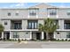 Charming townhome featuring a landscaped yard and balcony at 13042 Michael Callin Aly, Orlando, FL 32828